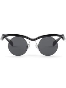 Prada Eyewear солнцезащитные очки Prada PR A24S в круглой оправе, черный