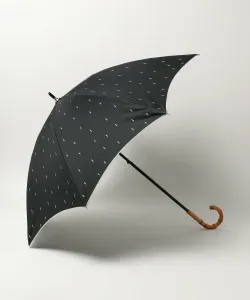Двухцветный зонт в горошек, подходящий как для солнечных, так и для дождливых дней.