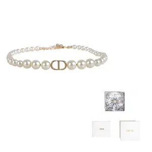 Женские золотые кулоны из смолы DIOR