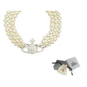 Чокер с тремя рядами жемчуга и барельефом Vivienne Westwood