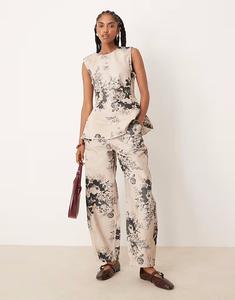 Брюки-бочонки с серо-коричневым цветочным принтом Asos Design