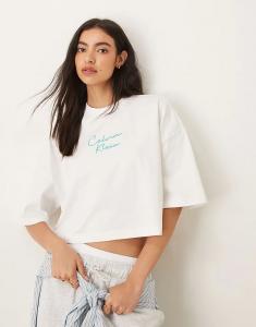 Укороченный свободный топ-майка с логотипом Calvin Klein Jeans в белую полоску