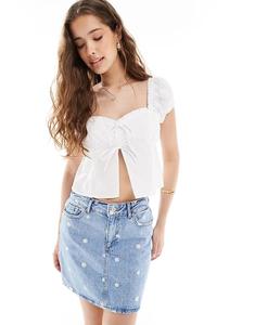 Мини-юбка из денима с вышивкой в виде ромашек ONLY светло-голубого цвета