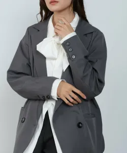 Двубортный жакет с оборками по низу