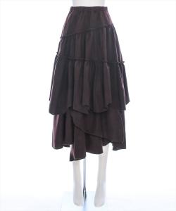 Длинная многоярусная юбка с однотонным и случайным узором