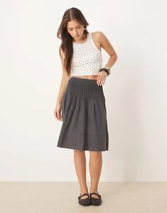 Юбка миди Free People Peyton с защипами длиной до колена, черного цвета с потертостями