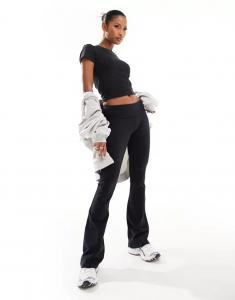 Мягкие расклешенные леггинсы для йоги черного цвета с облегающим кроем ASOS Icon