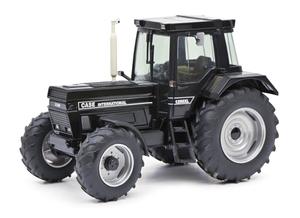 Металлическая коллекционная модель трактора Case IH 1455 XLA черный Limited Edition Schuco 1:32