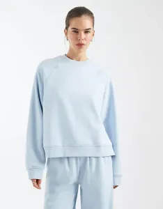 Нежно-голубой свободный свитшот с кисточкой и деталями реглан ASOS DESIGN