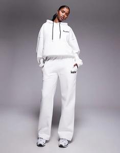 Спортивные брюки Kaiia из высококачественного хлопка с вышитым логотипом теннисного клуба на карманах, белого и темно-синего цветов