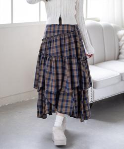 Длинная многоярусная юбка с однотонным и случайным узором