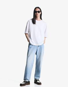 Джинсы Bershka Tapered свободного кроя средне-синего цвета