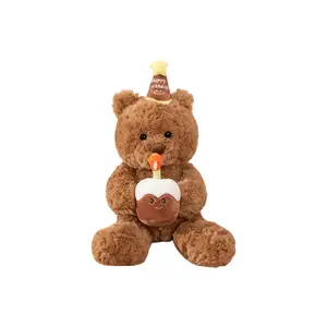 Плюшевый мишка в праздничном колпаке с обнимающей свечой XTHOT