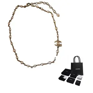CHANEL Металлическое ожерелье Women's Gold/White