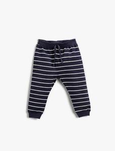 Зауженные брюки Koton, темно-синий