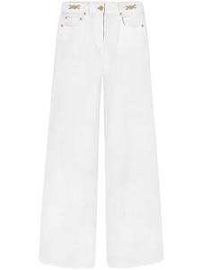 Расклешенные джинсы средней посадки Versace, белый