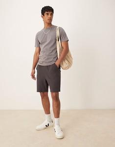 Короткие свободные шорты с вафельной текстурой черного цвета Asos Design