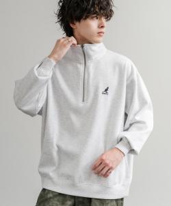 Специальный логотип коллаборации, вышитый на молнии до середины груди