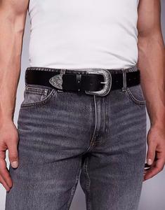 Ремень в стиле вестерн ASOS DESIGN из черной искусственной кожи с заклепками и черными кристаллами