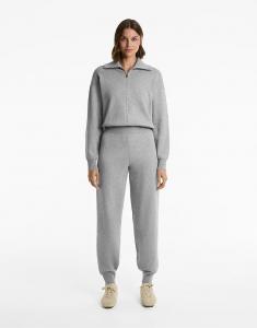 Длинный трикотажный комбинезон OYSHO с застежкой-молнией черного цвета