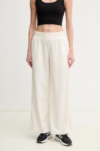 Основные элементы гардероба: спортивные штаны Puma, бежевый