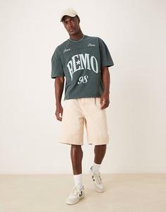 Удлиненные джинсовые шорты ASOS DESIGN со складками оранжевого оттенка