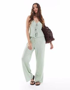 Брюки из текстурированного джерси в цвете «зеленый ил» Vero Moda