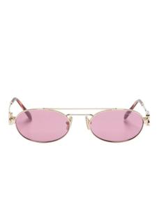 Miu Miu Eyewear солнцезащитные очки в овальной оправе с логотипом, розовый