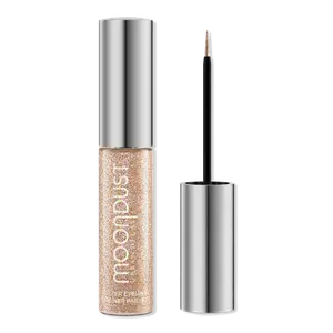 Жидкая подводка для глаз Moondust с блестками Urban Decay Cosmetics, Space Cowboy (peachy champagne shimmer with silver and mutli-color glitter)