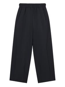 NIKE Штаны для тренировок свободного кроя в черном цвете