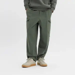 Мужские спортивные брюки городской функциональности с защитой от солнца в стиле workwear Decathlon SPORTSWEAR каменно-зелёные