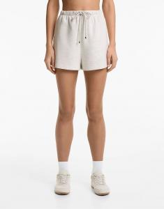 Шорты Oysho с широкими штанинами из хлопка и модала в бледно-сером меланжевом цвете.