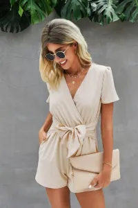 Эластичный комбинезон с поясом, глубоким вырезом и узлом по бокам Truedames