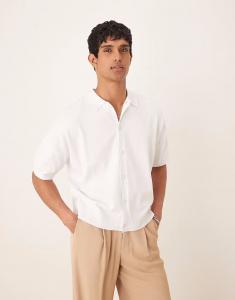 Трикотажное поло из хлопка на пуговицах белого цвета Asos Design