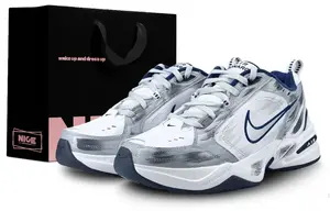 Nike Кроссовки Air Monarch 4 с износостойкой подошвой, унисекс, серо-белые
