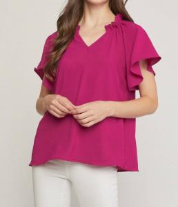Блузка с воланами и расклешенными рукавами в пурпурном цвете Entro