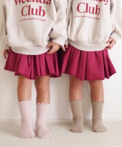 Плиссированная юбка с заправленными брюками