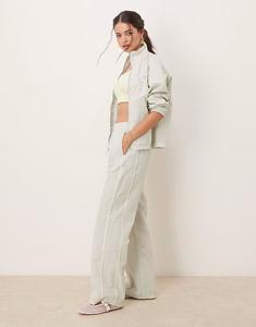 Спортивные брюки Windrunner серебристого цвета Nike