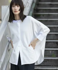 Хлопковый трикотаж, блузка с круглым вырезом и ребристой отделкой.