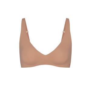 Бюстгальтер с глубоким вырезом SKIMS Naked, цвет Sienna