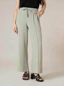 Deeluxe Широкие брюки 'Niski' в пастельно-зеленом цвете