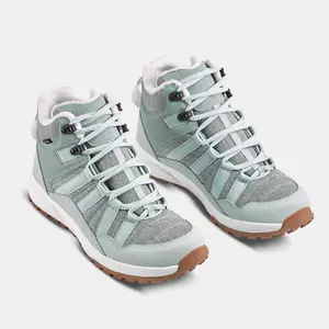 Женские зимние водонепроницаемые утеплённые треккинговые ботинки Quechua SH500 средние