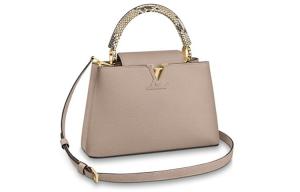 Сумка кросс-боди через плечо Capucines Grain Taurillon Leather Kapusin средний размер женская beige LOUIS VUITTON