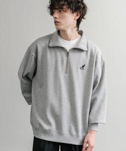 Специальный логотип коллаборации, вышитый на молнии до середины груди