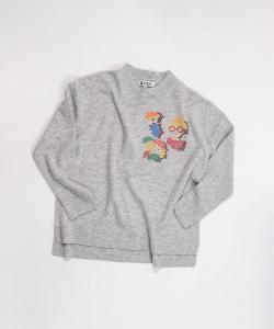 Вязаный свитер из 100% шерсти с пиксельной вышивкой.