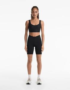 Леггинсы OYSHO V-образного выреза с высокой посадкой, облегающие, 20 см, черного цвета