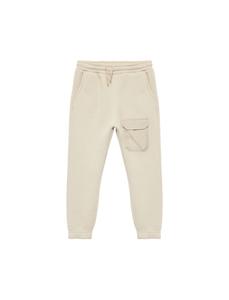 Koton Брюки с зауженным низом в бежевом цвете