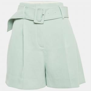 Хлопковые плиссированные шорты Sandro зеленого цвета
