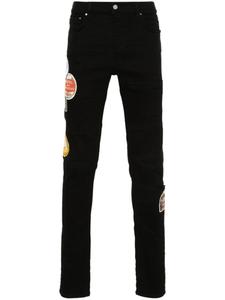 AMIRI джинсы скинни Travel Patch Repair, черный