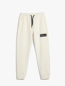 Зауженные брюки Koton, экрю